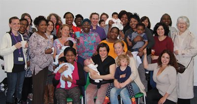 Group photo at breastfeeding pop-up 10-year celebration