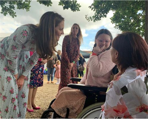 The Duchess of Cambridge meeting patient Louise at an outdoor event