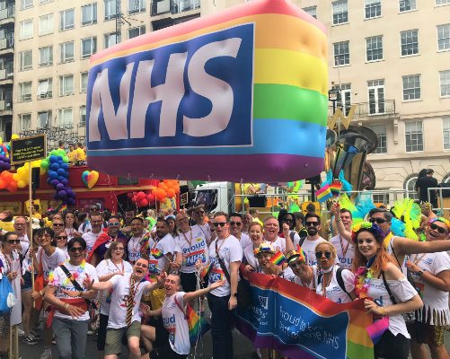 A NHS Rainbow Badge shaped blimp at the Pride parade in London