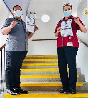 Federico and Shona, who both work in the Evelina London infection prevention and control team, holding Nightingale Award certificates
