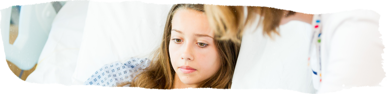 Girl in hospital bed at Evelina London