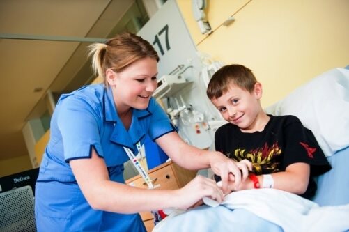 Nurse changing dressing