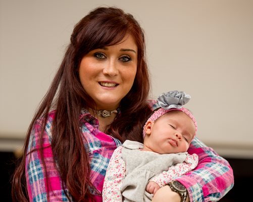 Alexandra holding baby Penelope