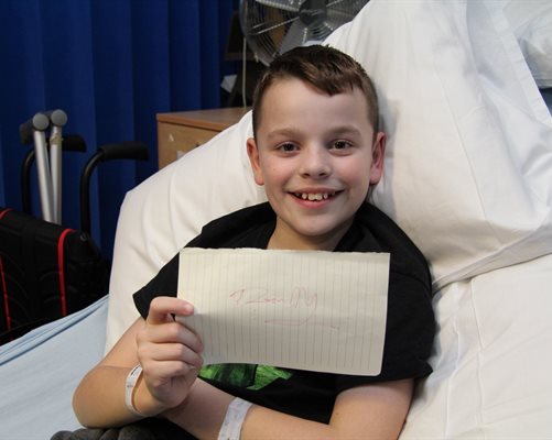 Jack with an autograph of the Prime Minister