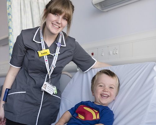 Research nurse with boy patient portrait