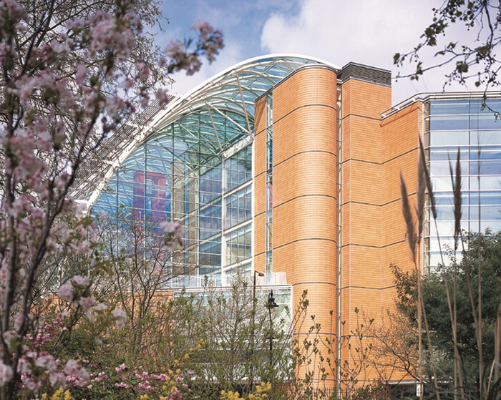 The exterior of Evelina London hospital with summer flowers