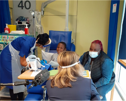Cruz and his mum with a nurse and Victoria Derbyshire