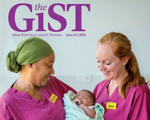 The GiST magazine cover showing two members of the maternity team with a baby.