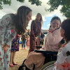 The Duchess of Cambridge in a garden with an Evelina London patient.