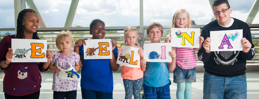 Patients holding up letters spelling out Evelina