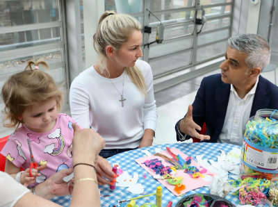 Mayor of London with a little girl and her mum