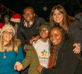 Tourae with his mum, brother and Evelina London staff.