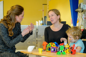 HRH The Duchess of Cambridge in Beach ward with an Evelina London patient and their mother.