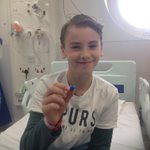 Boy on hospital bed at Evelina London receiving treatment