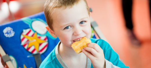 Boy eating toast