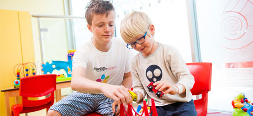 Two boys in the play area at Evelina London