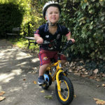 Evelina patient, Sam Short, riding his bike