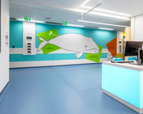 A wall decoration in Sky ward showing a whale.